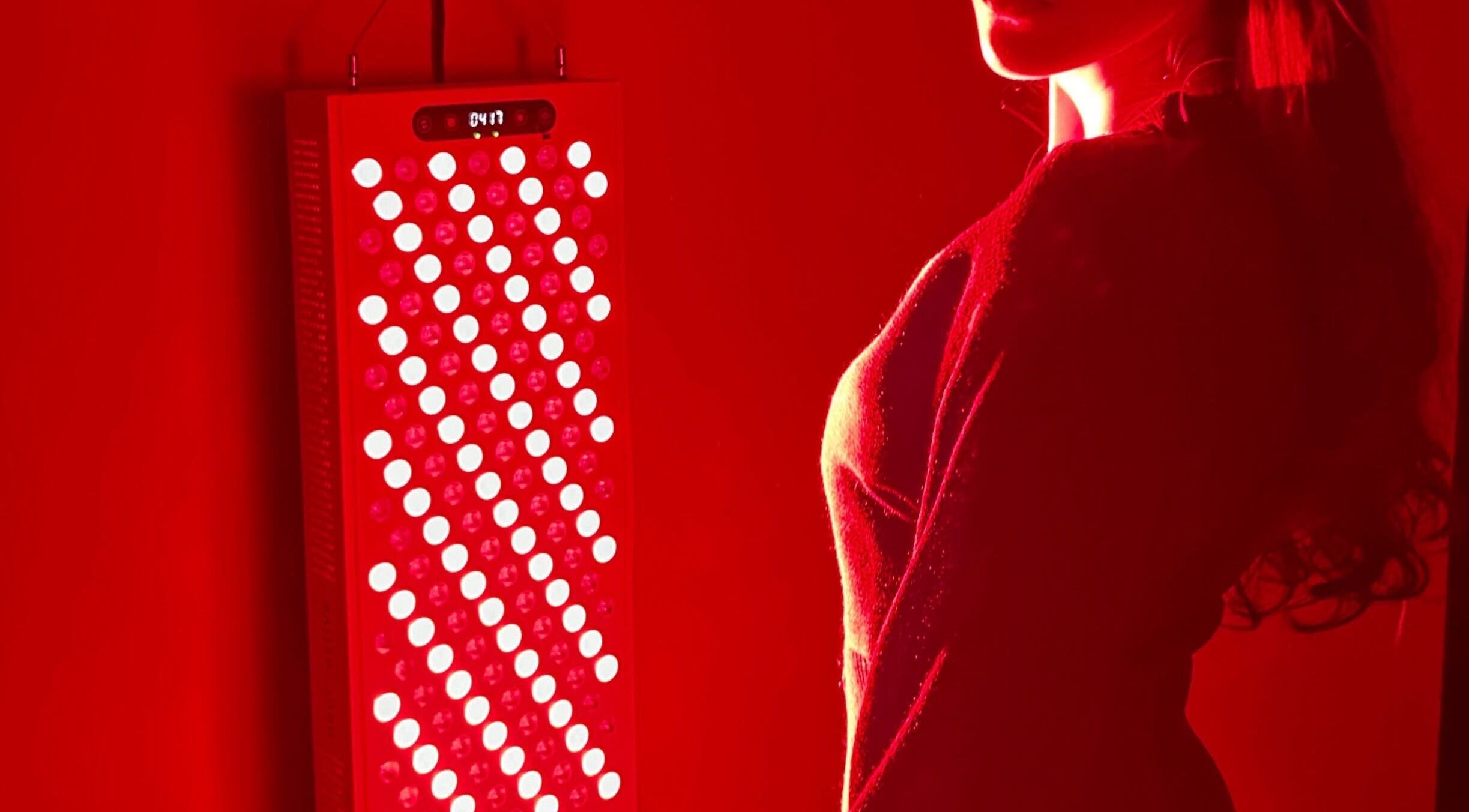 Woman experiencing red light therapy at GlowHaus in Umhlanga, Kwazulu-natal, ZA, enhancing wellness and relaxation.