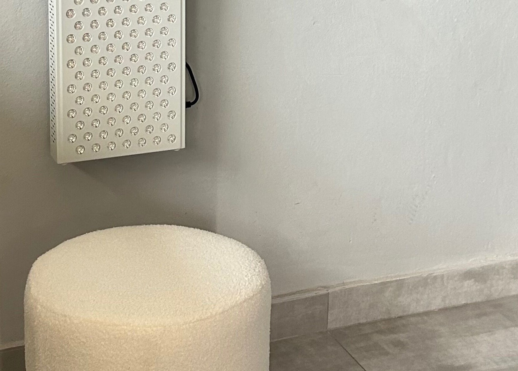 LED light panel and stool at GlowHaus, Umhlanga, Kwazulu-natal, ZA, ideal for beauty treatments.