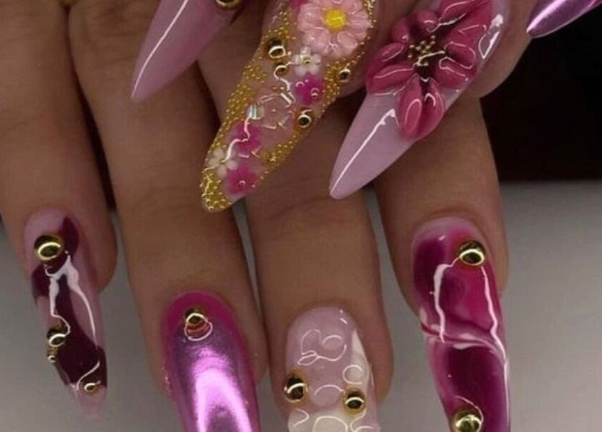 Elegant floral nail art at Labelle Nails Studio, Durban, Kwazulu-natal, ZA, showcasing intricate designs and vibrant colors.