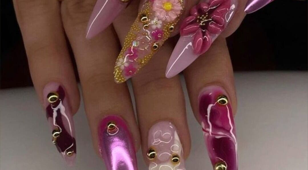 Elegant floral nail art at Labelle Nails Studio, Durban, Kwazulu-natal, ZA, showcasing intricate designs and vibrant colors.