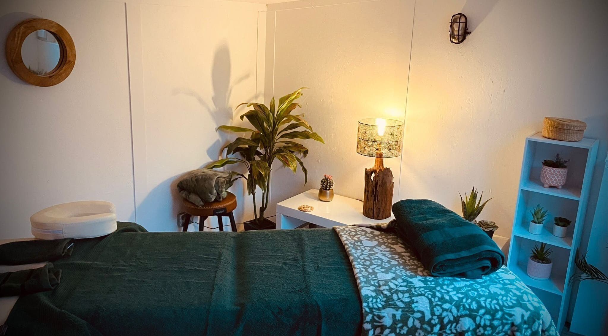 Cozy treatment room with soft lighting at Oh Darling in Bournemouth, England, GB.