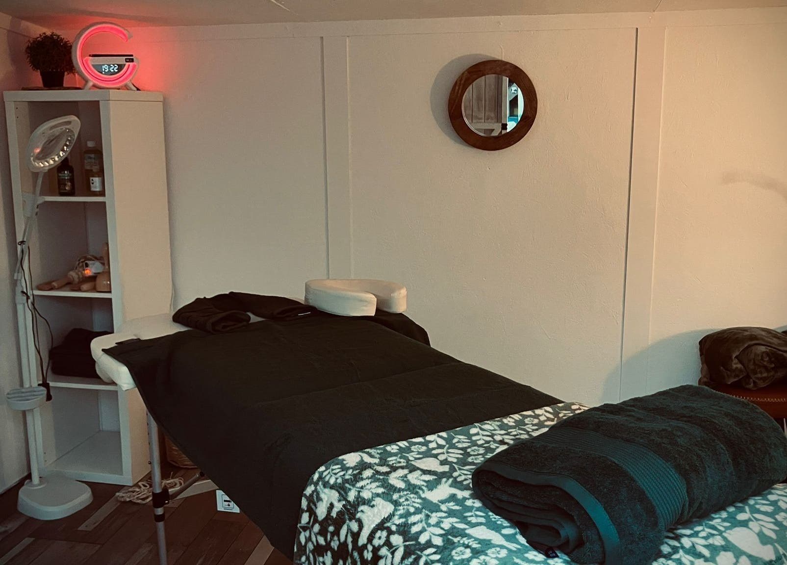 Relaxing massage room at Oh Darling in Bournemouth, England, GB, with a cozy table and calming decor.