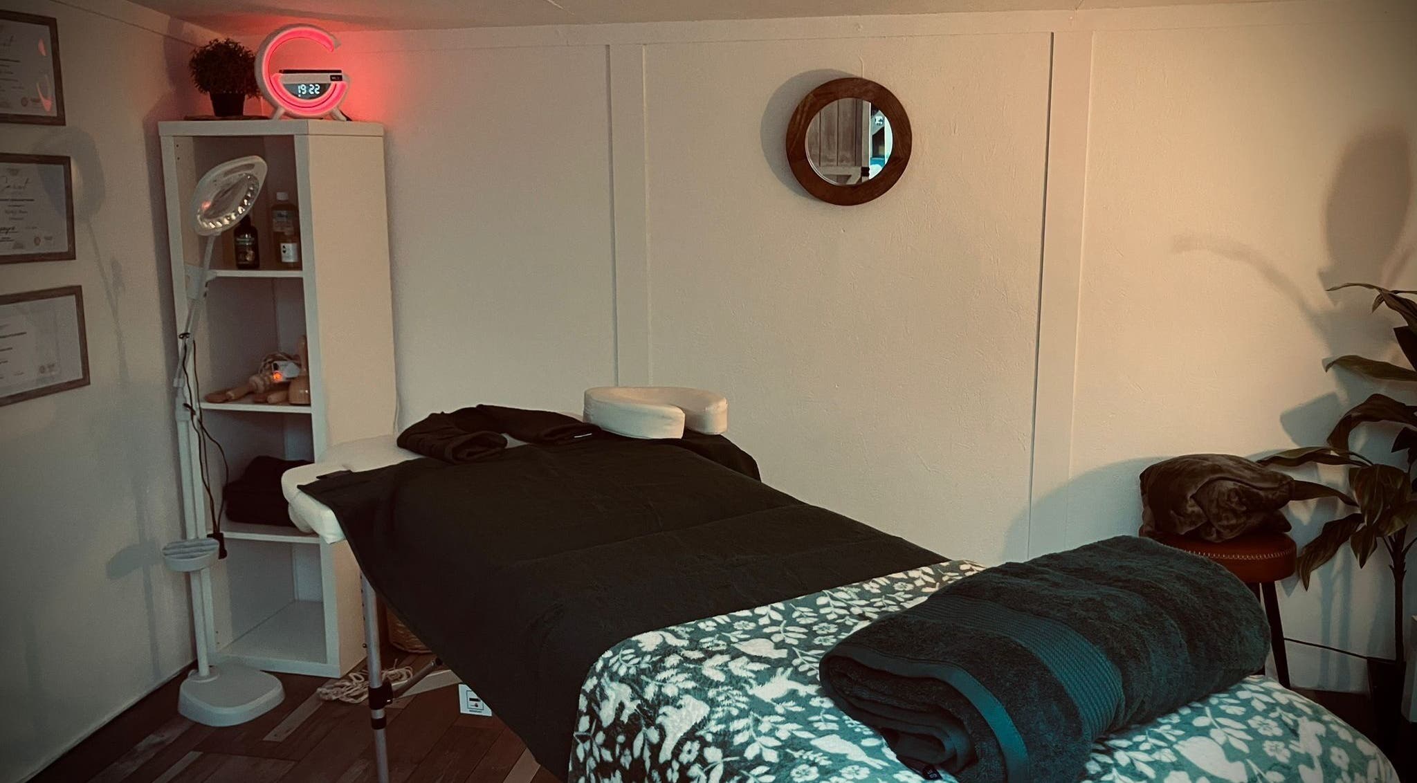 Relaxing massage room at Oh Darling in Bournemouth, England, GB, with a cozy table and calming decor.