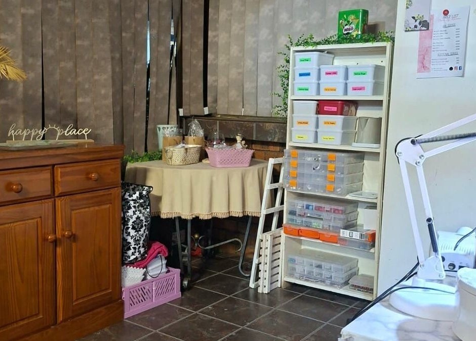 Nails by Roelene's welcoming corner in Krugersdorp, Gauteng, ZA, featuring organized storage and a tranquil vibe.