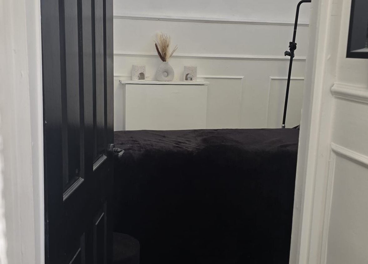 Cozy treatment room at KD Beauty, Cockenzie, Scotland, GB, featuring a serene setup with elegant decor.