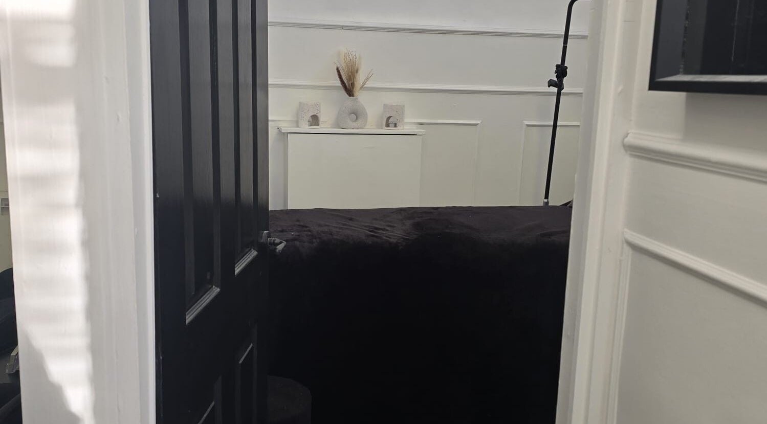 Cozy treatment room at KD Beauty, Cockenzie, Scotland, GB, featuring a serene setup with elegant decor.