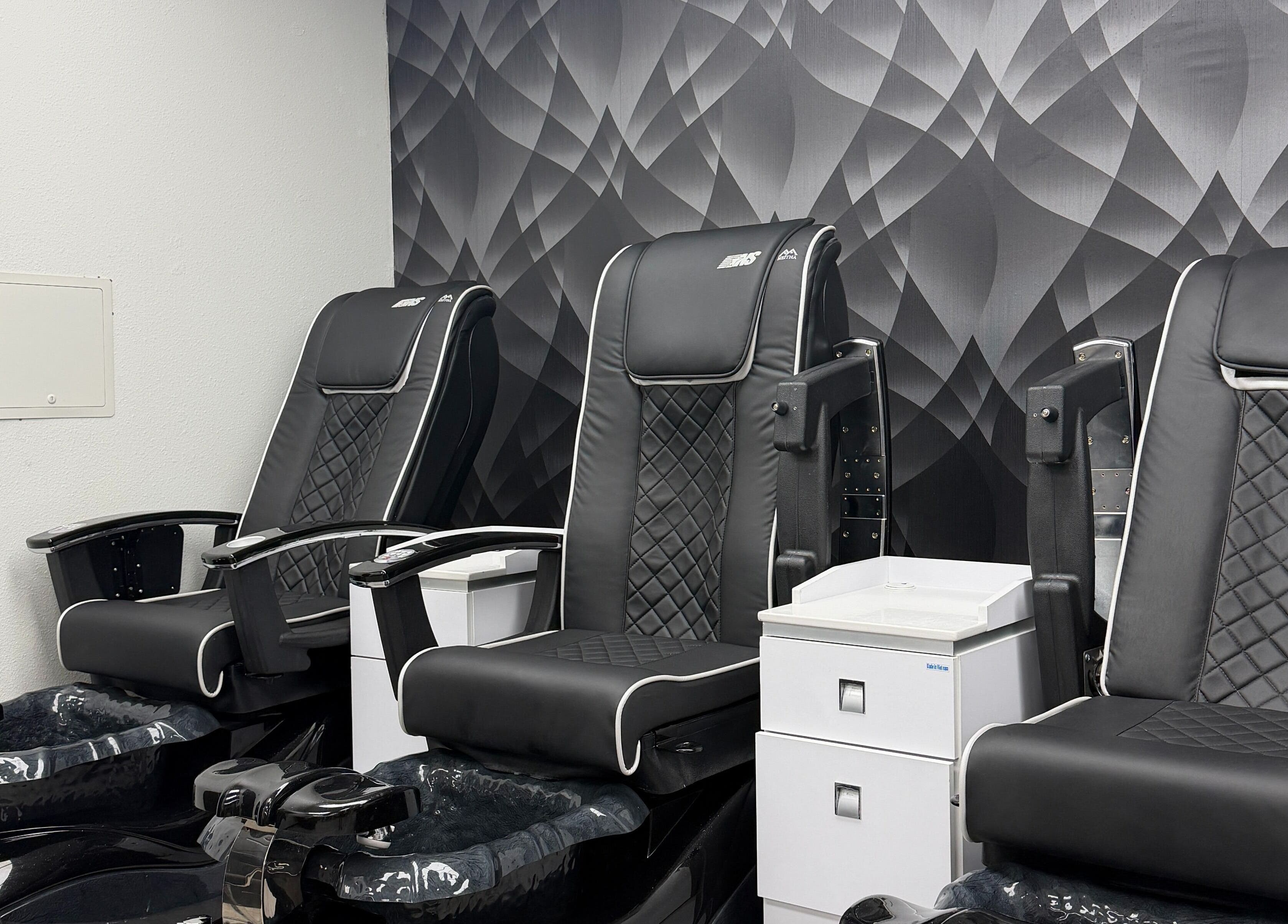 Luxurious pedicure chairs at Euphoria Salon, Mcallen, Texas, US, offering premium beauty services.