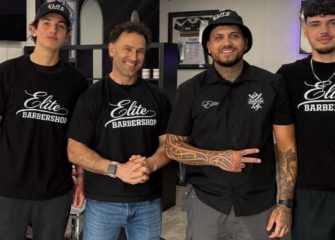Team of barbers at The Elite Barbershop in Fyshwick, Australian Capital Territory, AU, ready to serve.