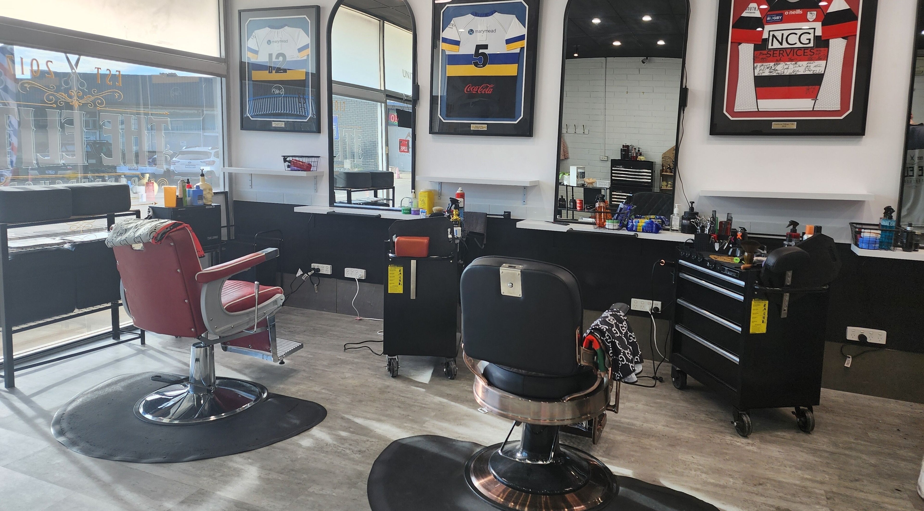 Modern barber chairs and equipment inside The Elite Barbershop in Fyshwick, Australian Capital Territory, AU.