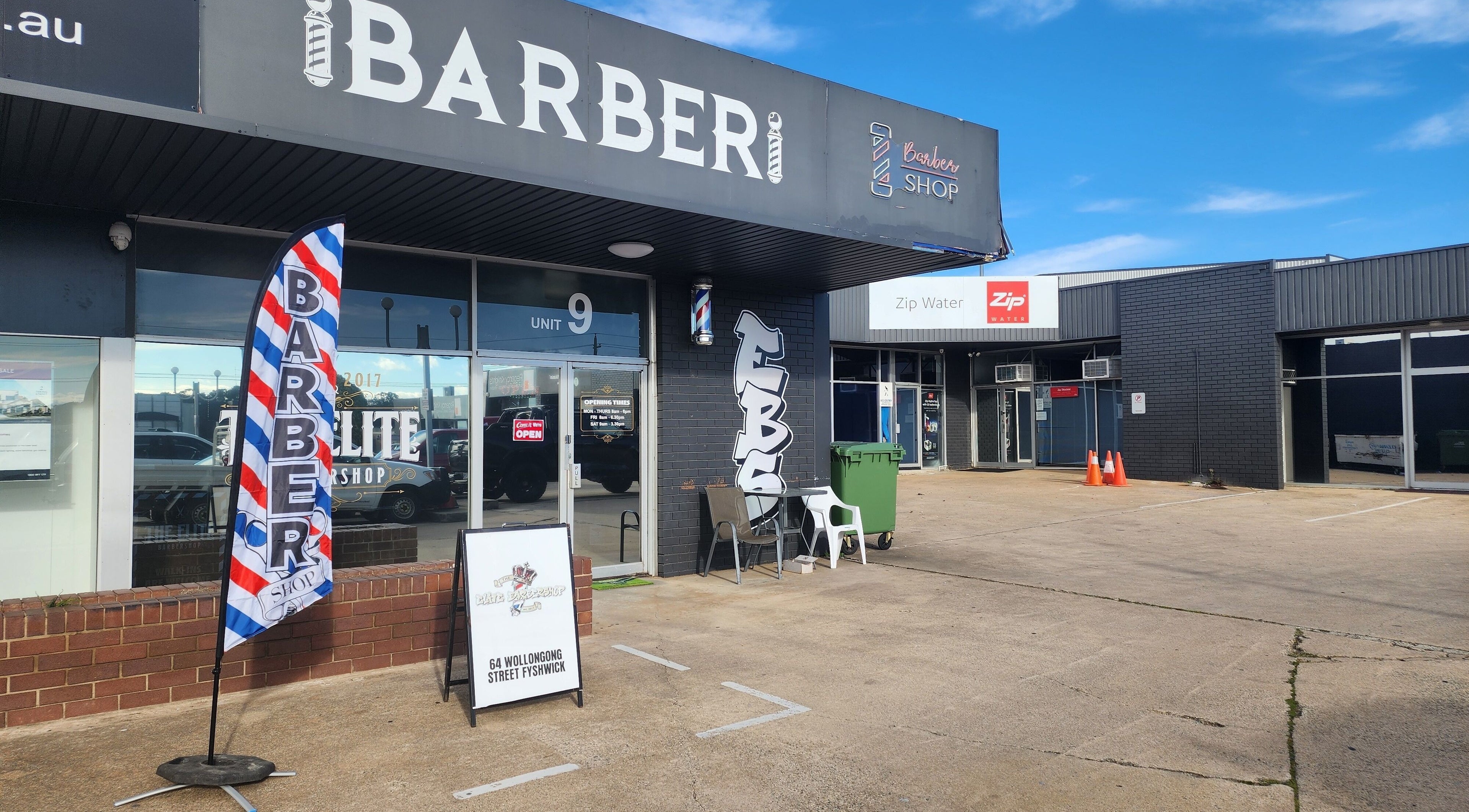 The Elite Barbershop entrance in Fyshwick, Australian Capital Territory, AU, showcasing its inviting facade.