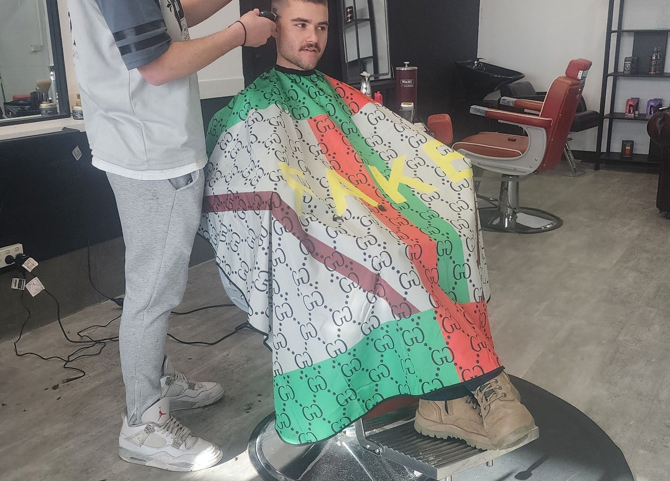 Client getting a haircut at The Elite Barbershop in Fyshwick, Australian Capital Territory, AU.