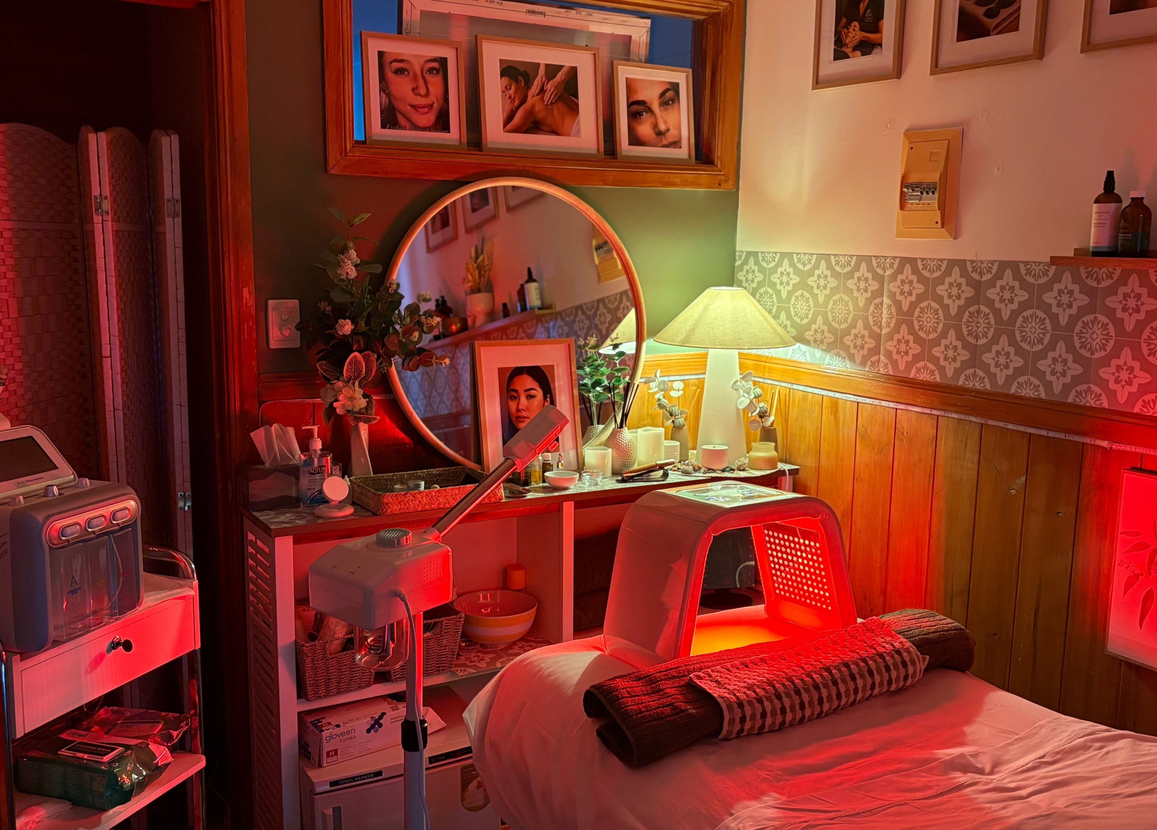 Cozy spa room at Melba Stewart Brows & Body in Eumundi, Queensland, AU, featuring skincare equipment and decor.