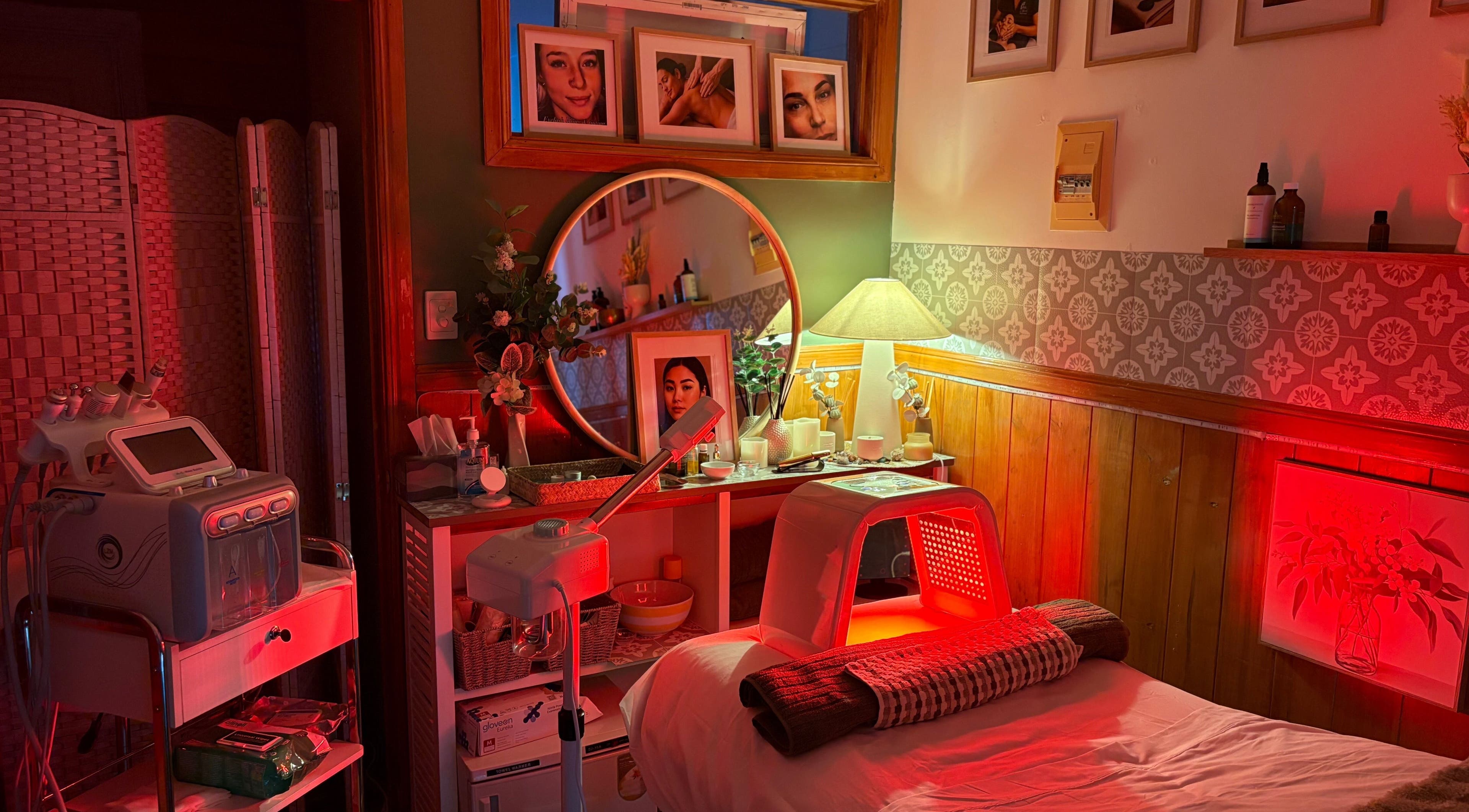 Cozy spa room at Melba Stewart Brows & Body in Eumundi, Queensland, AU, featuring skincare equipment and decor.