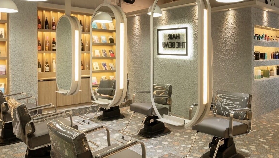 Chic interior of Hair The Beau Nowon in 서울특별시, 서울특별시, KR showcasing modern styling chairs.