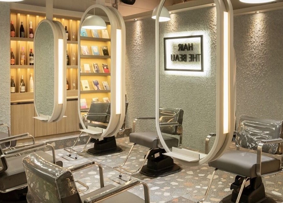 Chic interior of Hair The Beau Nowon in 서울특별시, 서울특별시, KR showcasing modern styling chairs.