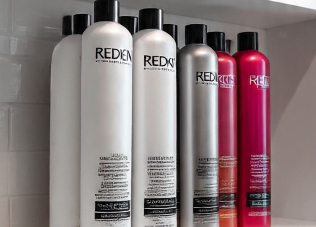 LuxehairbyJo beauty products display in Wellington, Florida, US, showcasing Redken haircare assortment.