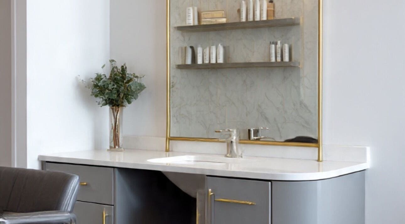 Sleek salon vanity at LuxehairbyJo in Wellington, Florida, US, featuring modern decor and premium products.