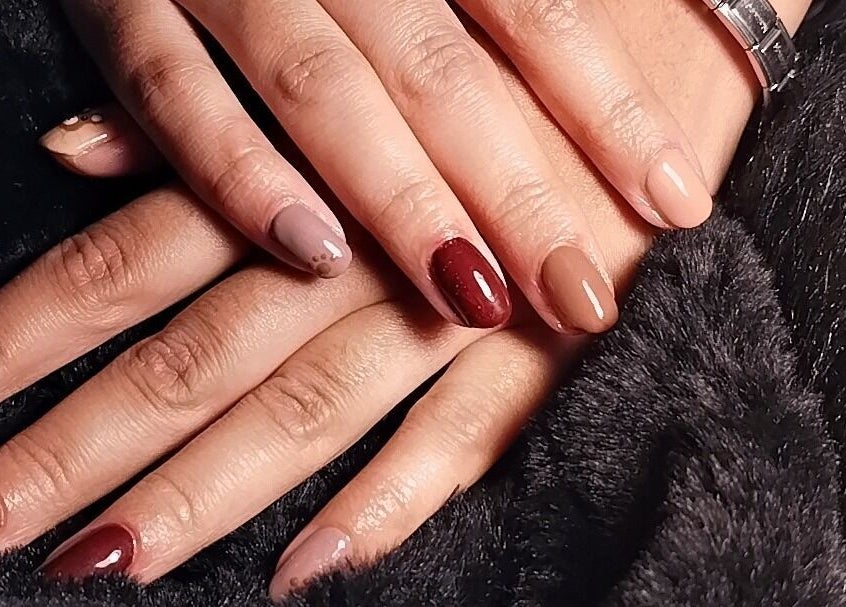 Elegant nail art by Nails By Courtney in Cape Town, Western Cape, ZA showcasing diverse polish shades.