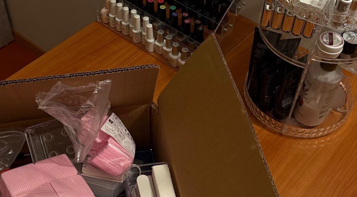 Nailplug.Linlee supplies and polishes on display at Roveré Della Luna, Trentino-alto Adige, IT.