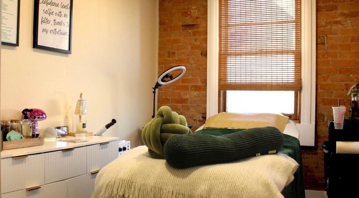 Relaxing spa room at Orbit Esthetics in Covington, Kentucky, US with soothing decor and ambient lighting.