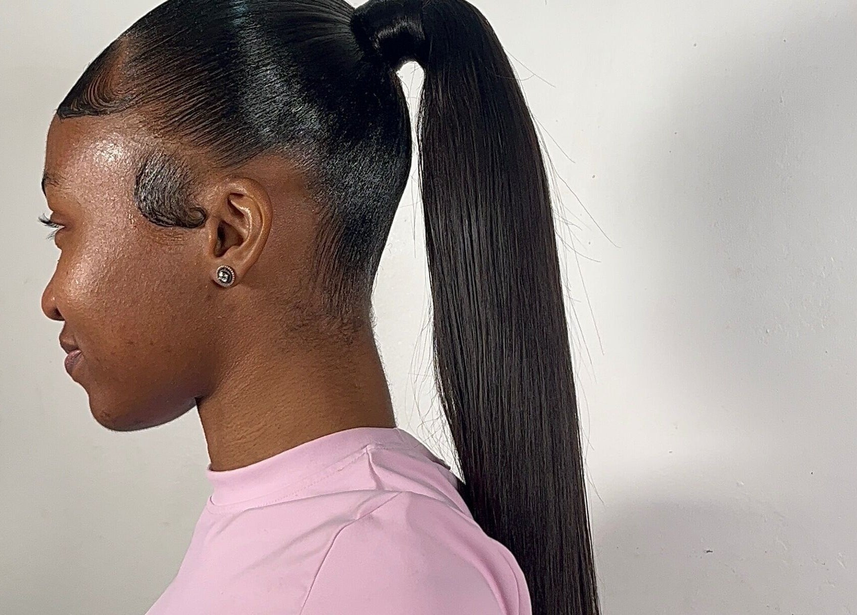 Sleek ponytail hairstyle at Milano Stylez in Oistins, Christ Church, BB