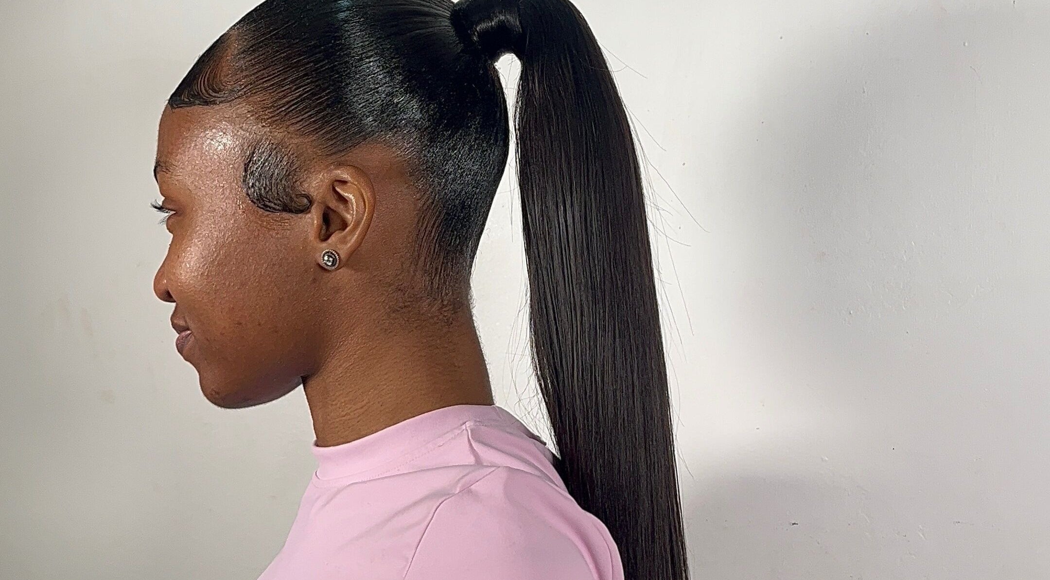 Sleek ponytail hairstyle at Milano Stylez in Oistins, Christ Church, BB