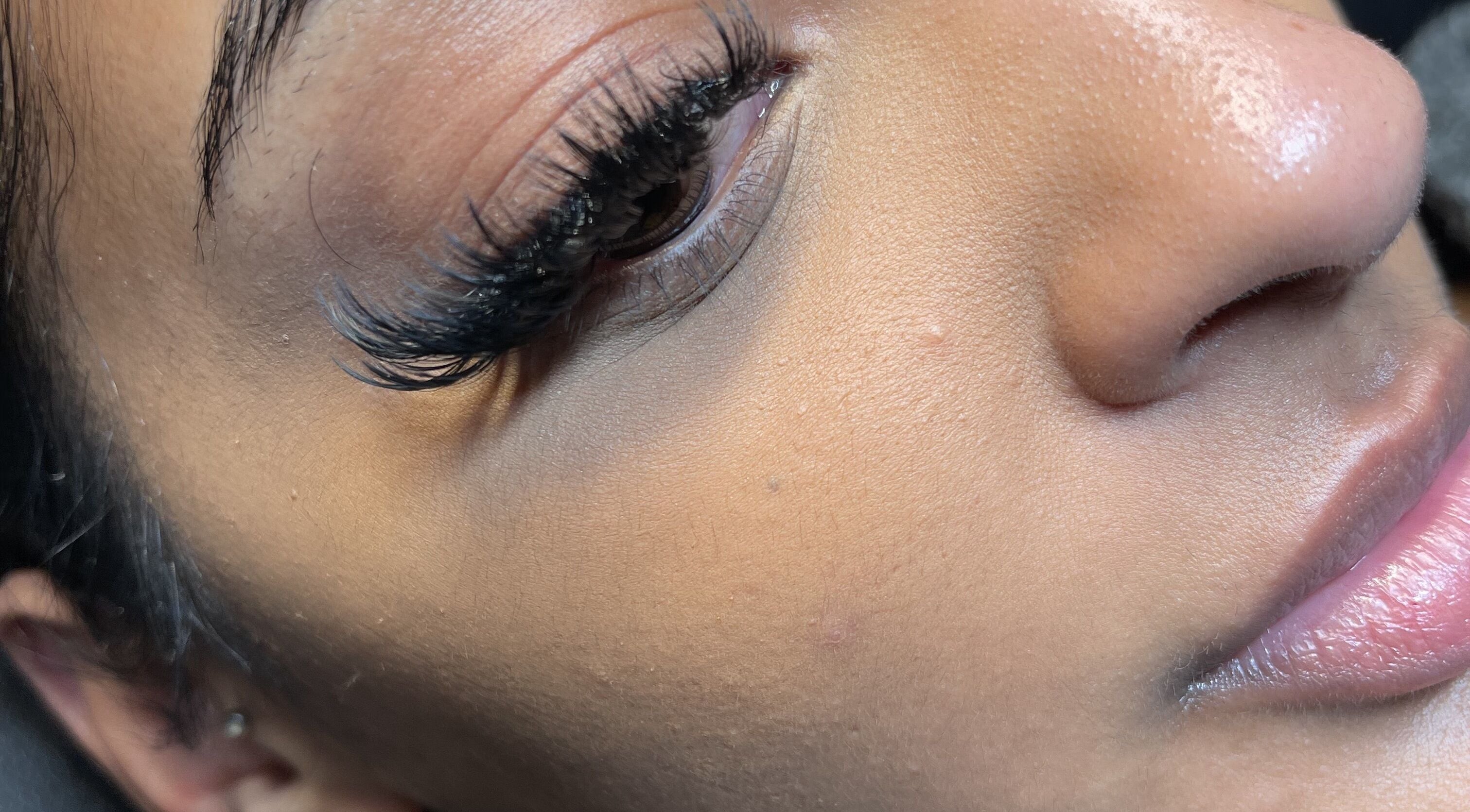 Close-up of expertly applied eyelashes by FreedzMUA | Makeup and Lashess, London, England, GB.