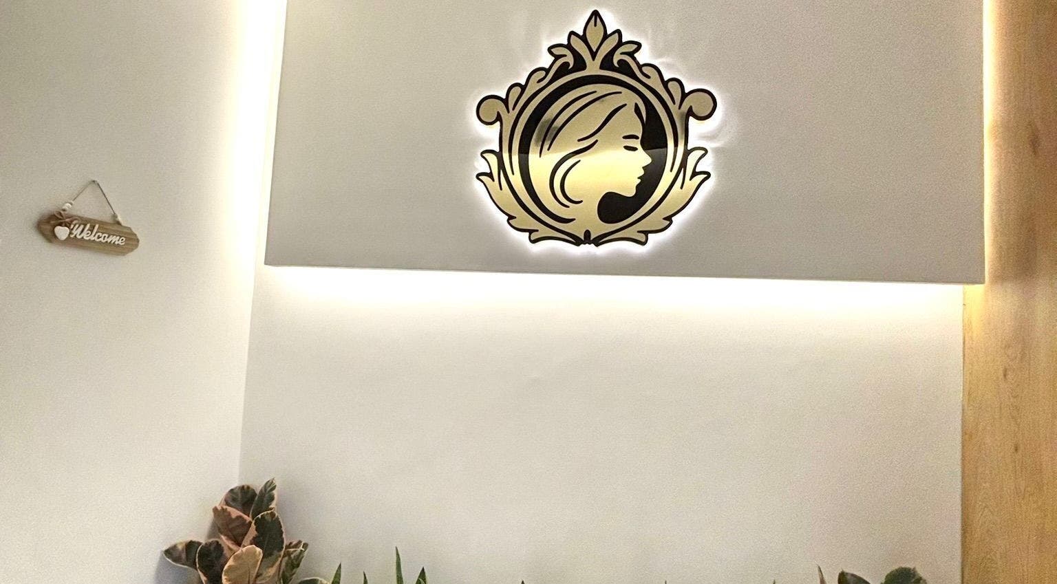 Sophisticated logo and welcome sign at Sisters Retreat Salon and Spa in Doha, Doha Municipality, QA.