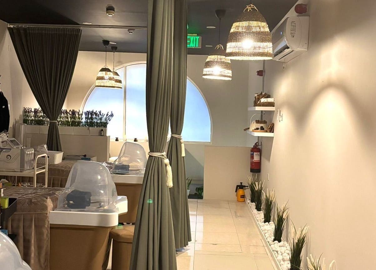 Relaxing interior of Sisters Retreat Salon and Spa, Doha, Doha Municipality, QA with serene lighting and decor.