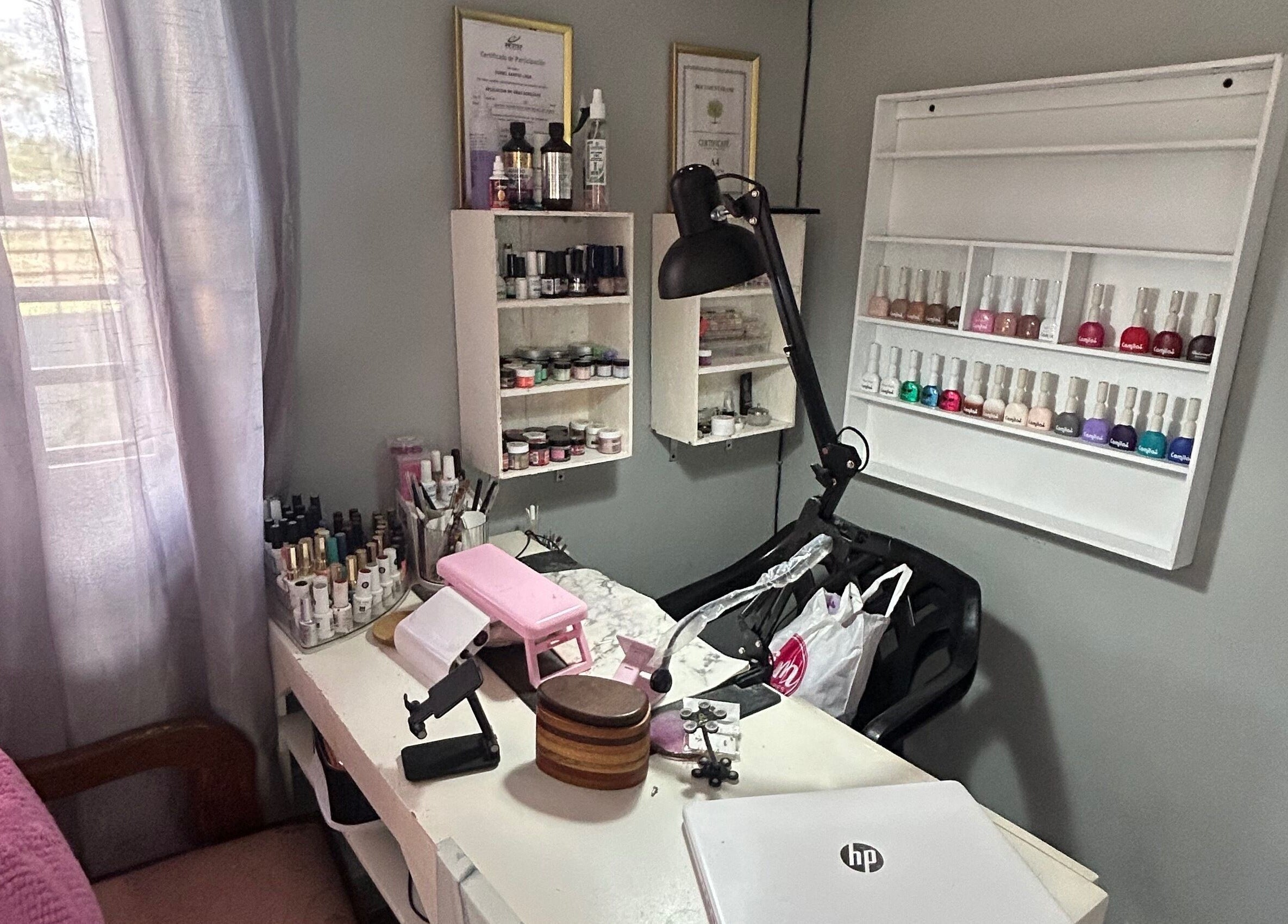 Yurii Nails manicure station with colorful polish in Santo Domingo Este, Santo Domingo, DO.