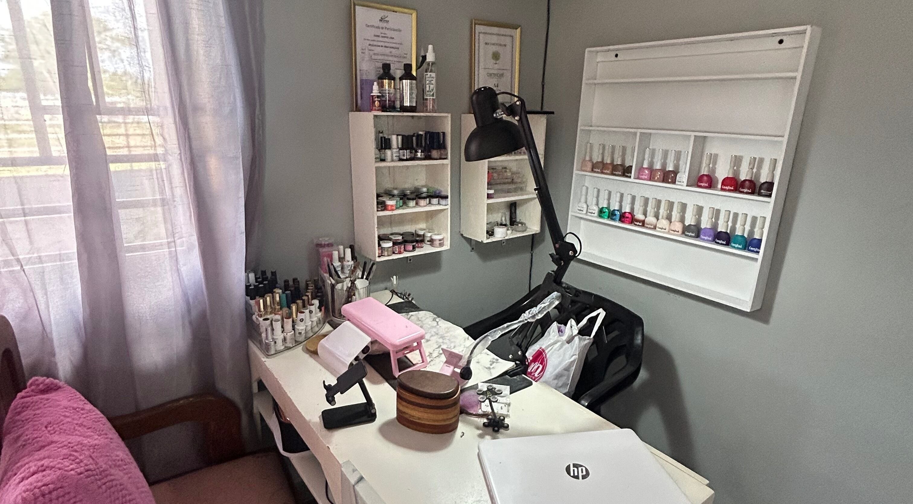Yurii Nails manicure station with colorful polish in Santo Domingo Este, Santo Domingo, DO.