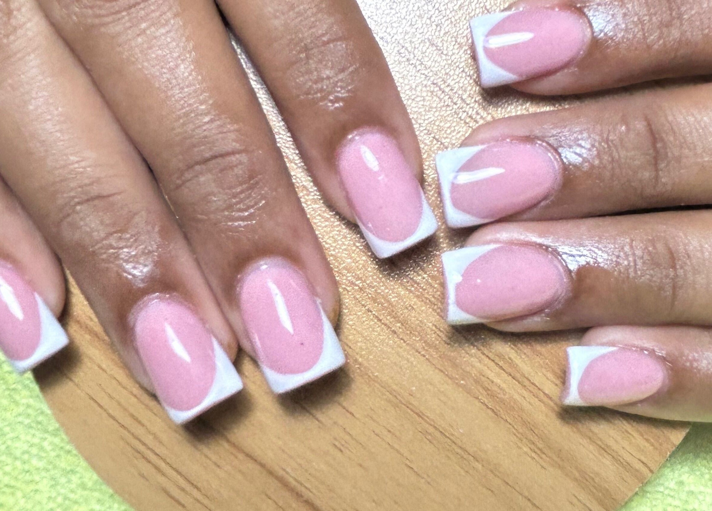 Elegant French manicure at Yurii Nails, Santo Domingo Este, Santo Domingo, DO, showcasing glossy pink nails.
