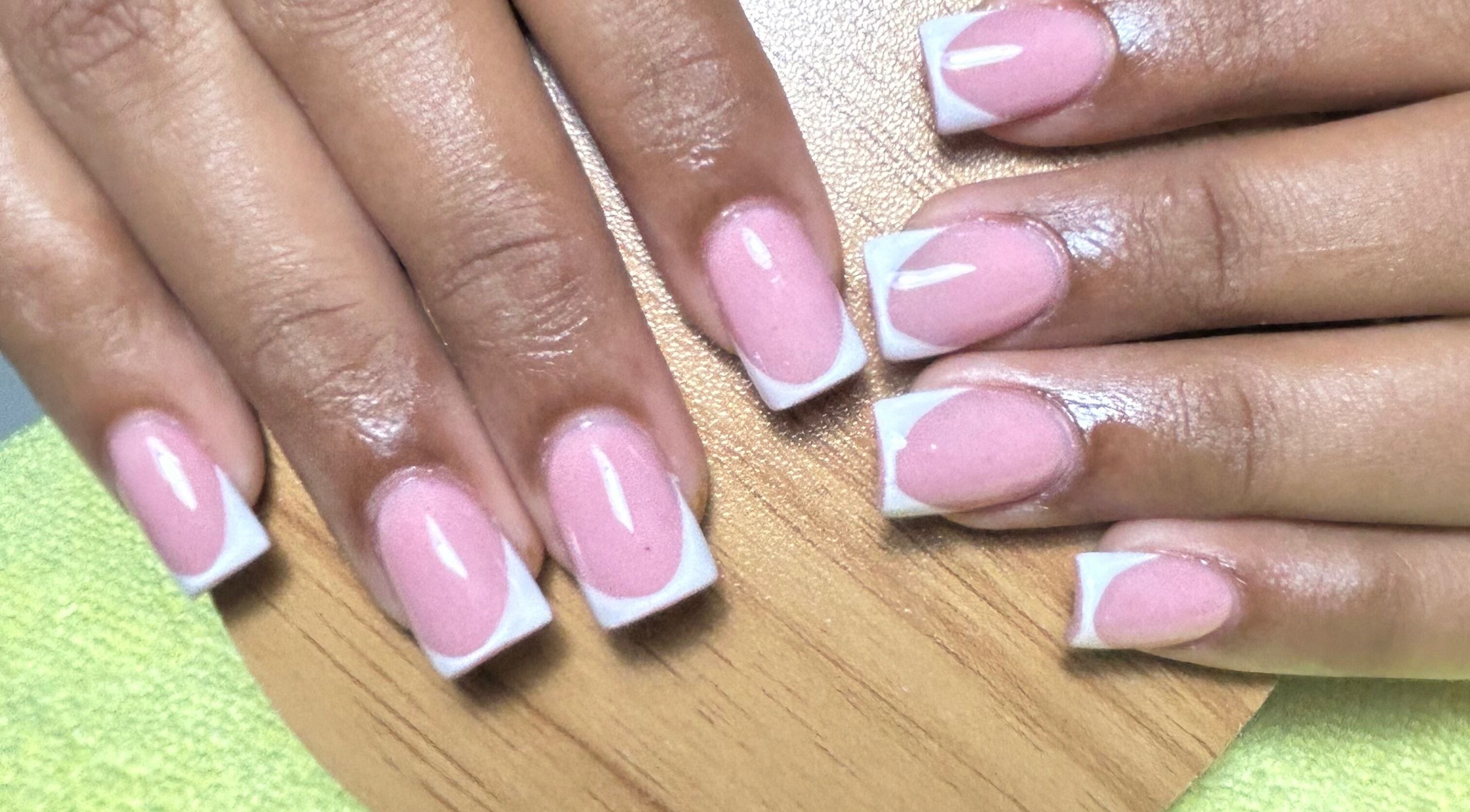 Elegant French manicure at Yurii Nails, Santo Domingo Este, Santo Domingo, DO, showcasing glossy pink nails.