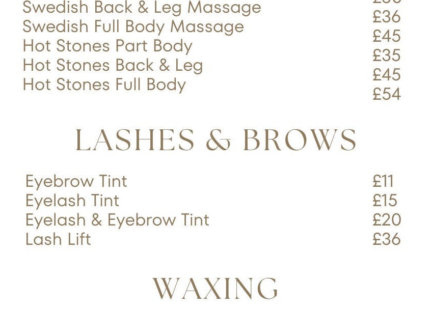 Service menu showing massage and lash prices at EB Beauty in Newbury, England, GB.