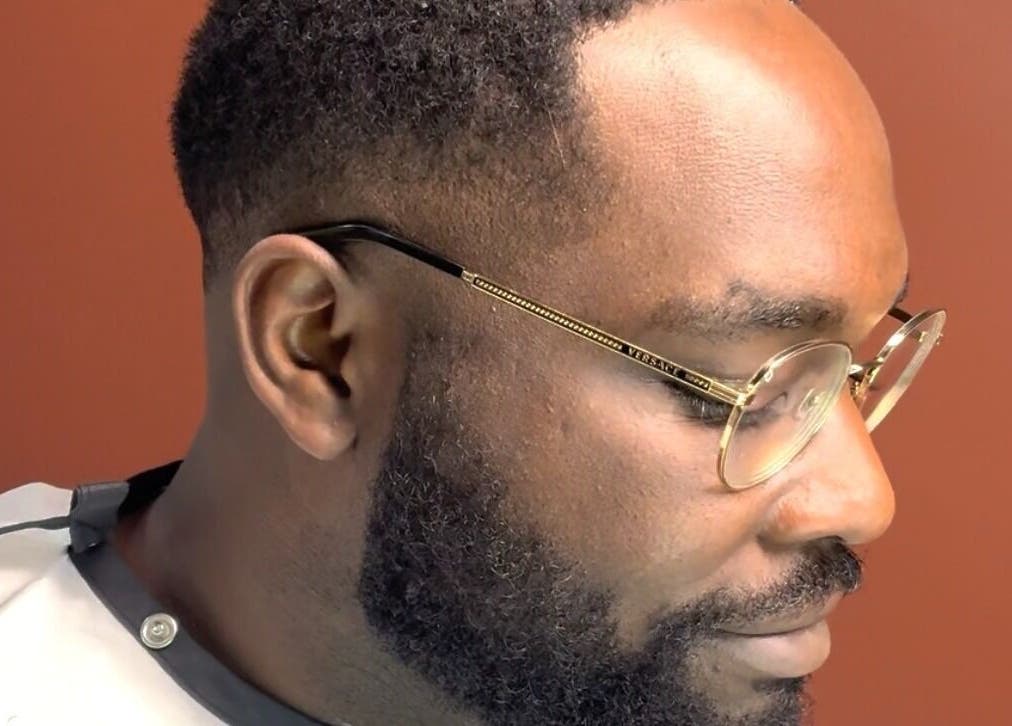 Man with trimmed beard and glasses at Velor Studio in Waterloo, Ontario, CA.