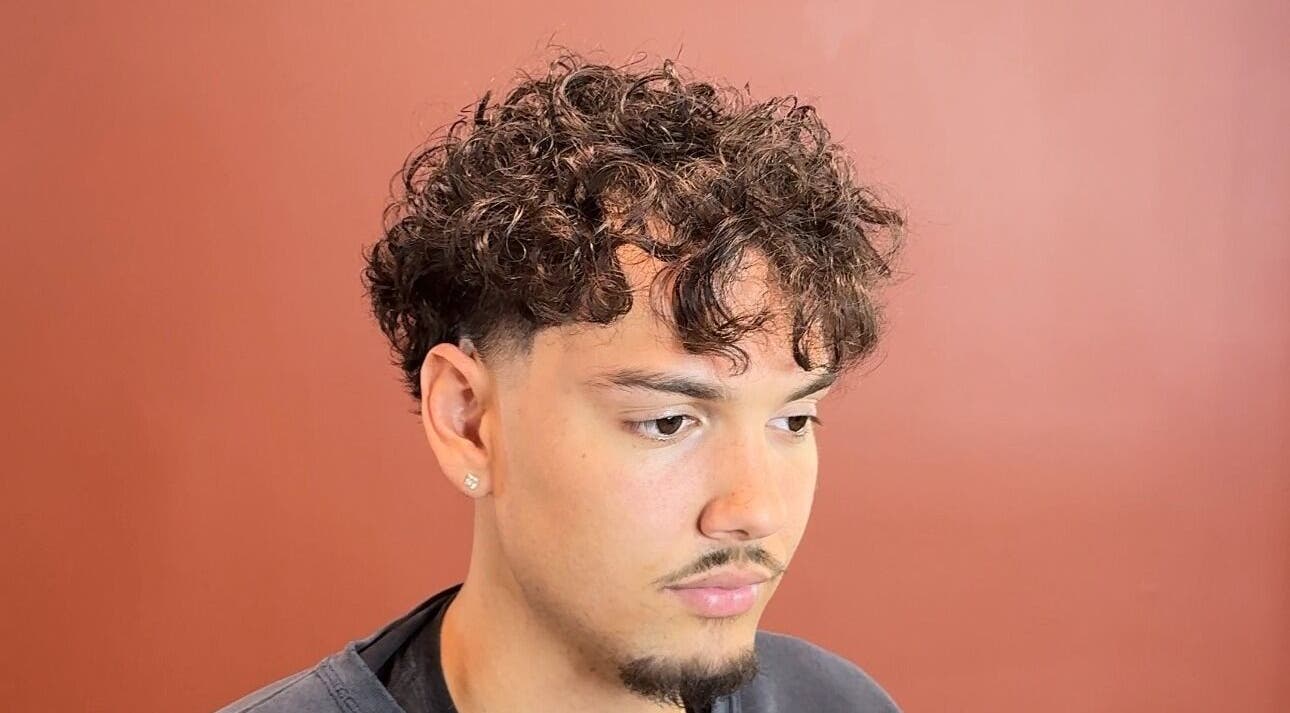 Modern curly haircut at Velor Studio, Waterloo, Ontario, CA.