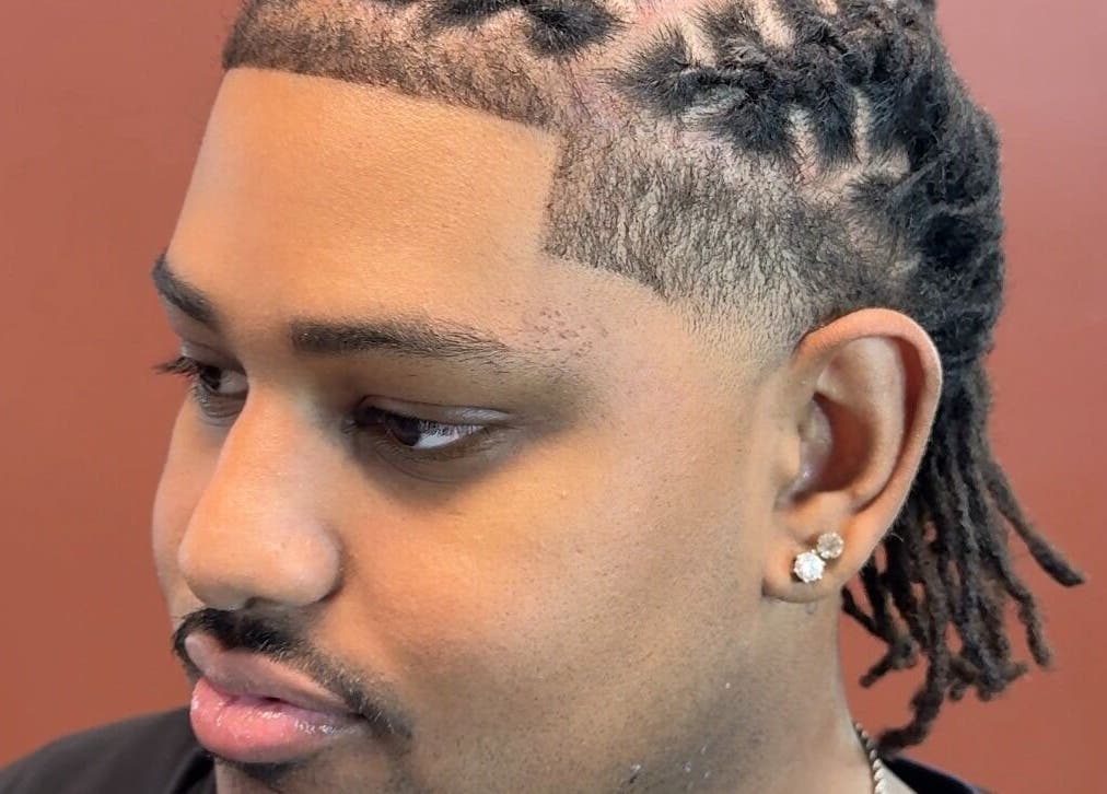 Styled braids at Velor Studio, Waterloo, Ontario, CA showcasing expert hair design.