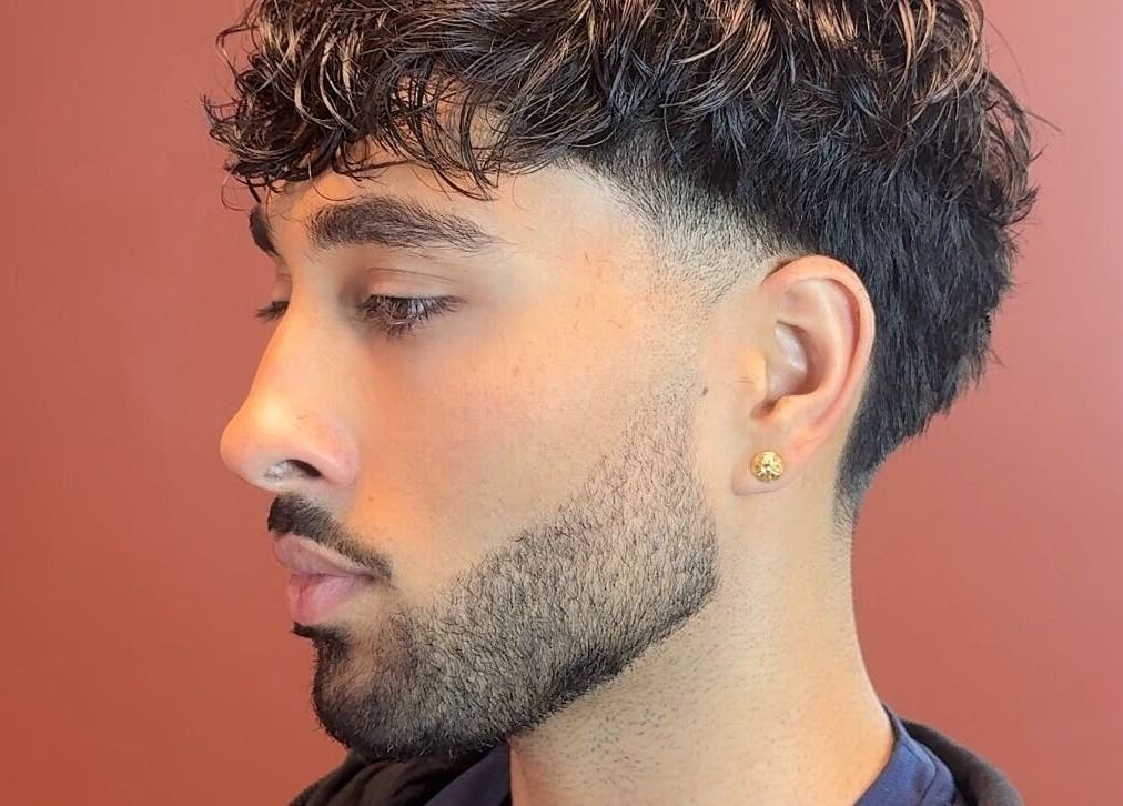 Close-up of a stylish haircut at Velor Studio, Waterloo, Ontario, CA, showcasing expert grooming techniques.