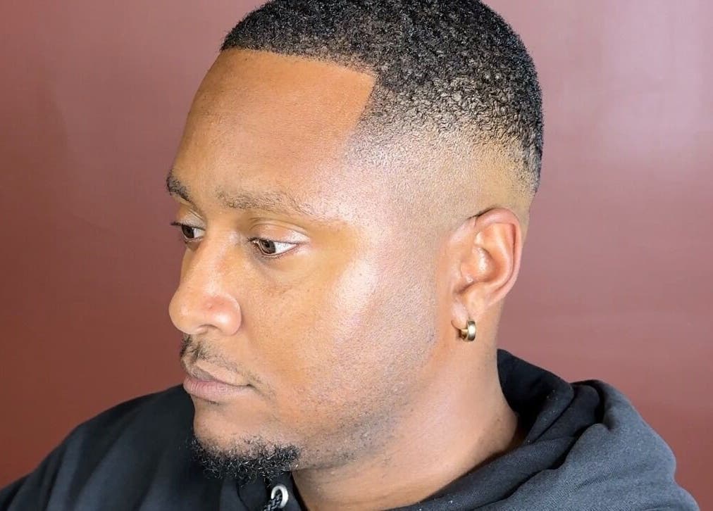 Close-up of a sleek fade haircut at Velor Studio, Waterloo, Ontario, CA showing expert barber skills.