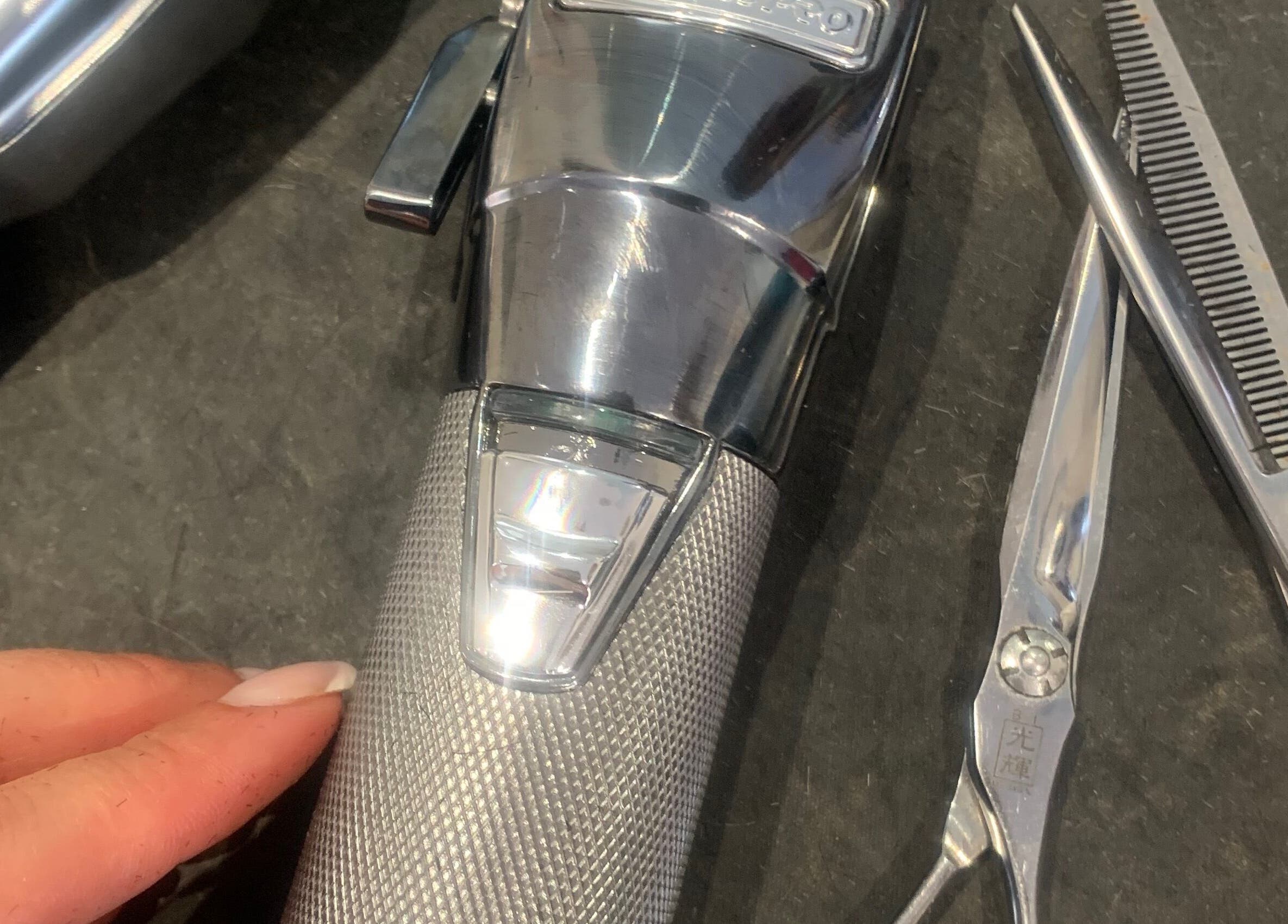 Professional haircut tools at Hair by Petra, Salisbury, England, GB, showcasing quality craftsmanship.