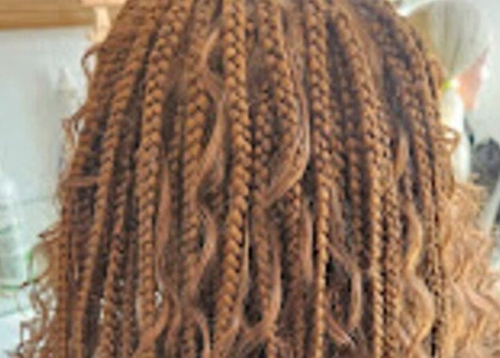 Intricate braiding at Priceless Hair and Beauty in Slough, England, GB showcases expert styling.