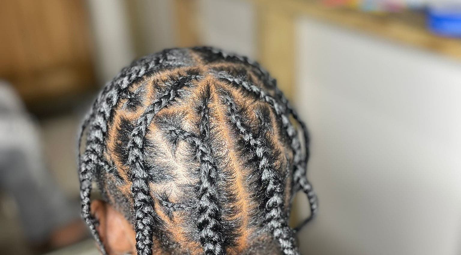 Intricate braided hairstyle at Island Braids Beauty Lounge, Bridgetown, Saint Michael, BB.