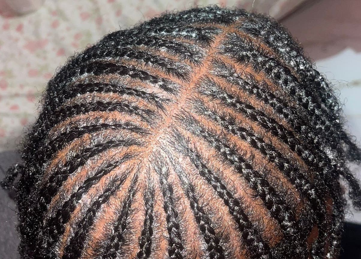 Close-up of intricate braids at Island Braids Beauty Lounge in Bridgetown, Saint Michael, BB.