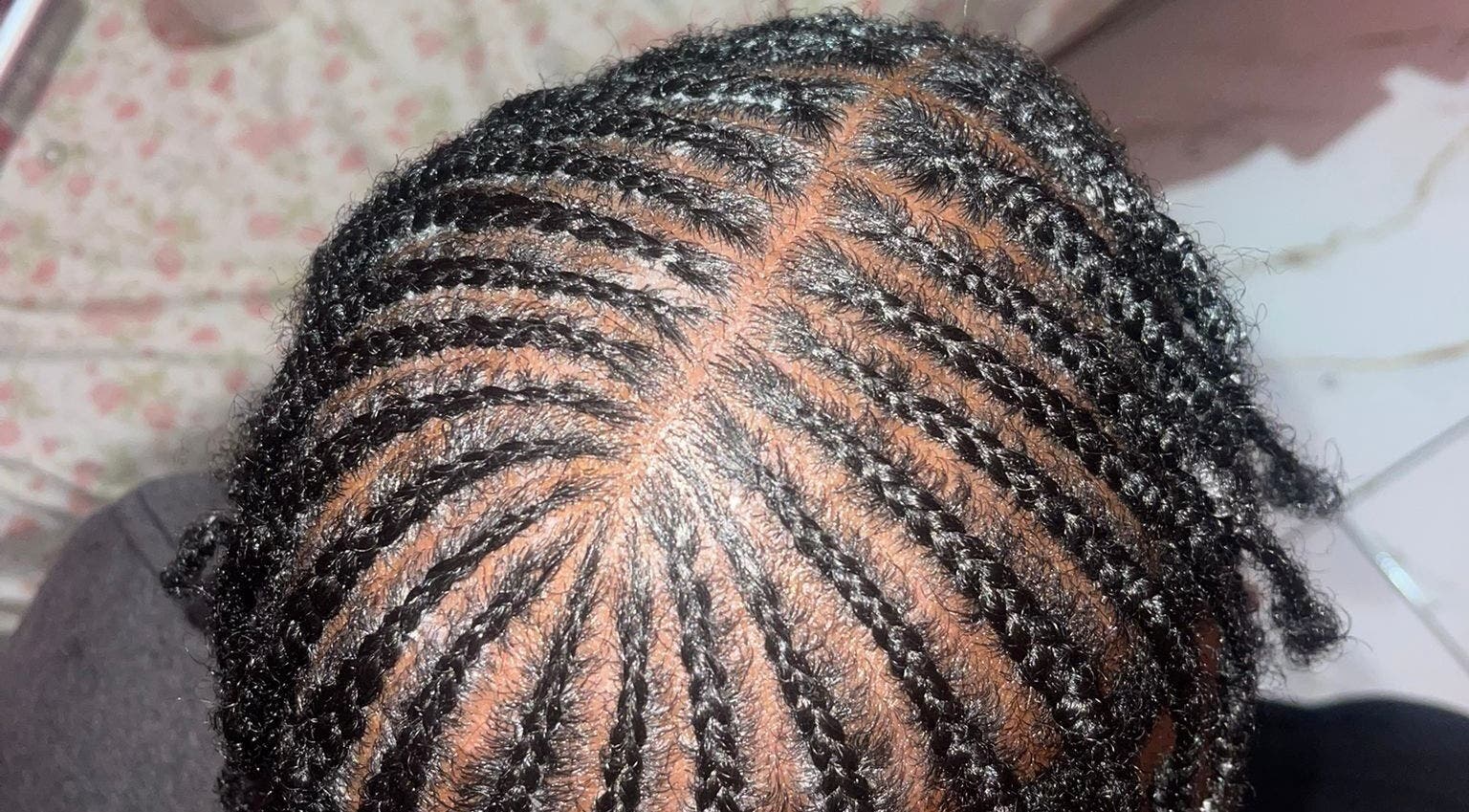 Close-up of intricate braids at Island Braids Beauty Lounge in Bridgetown, Saint Michael, BB.