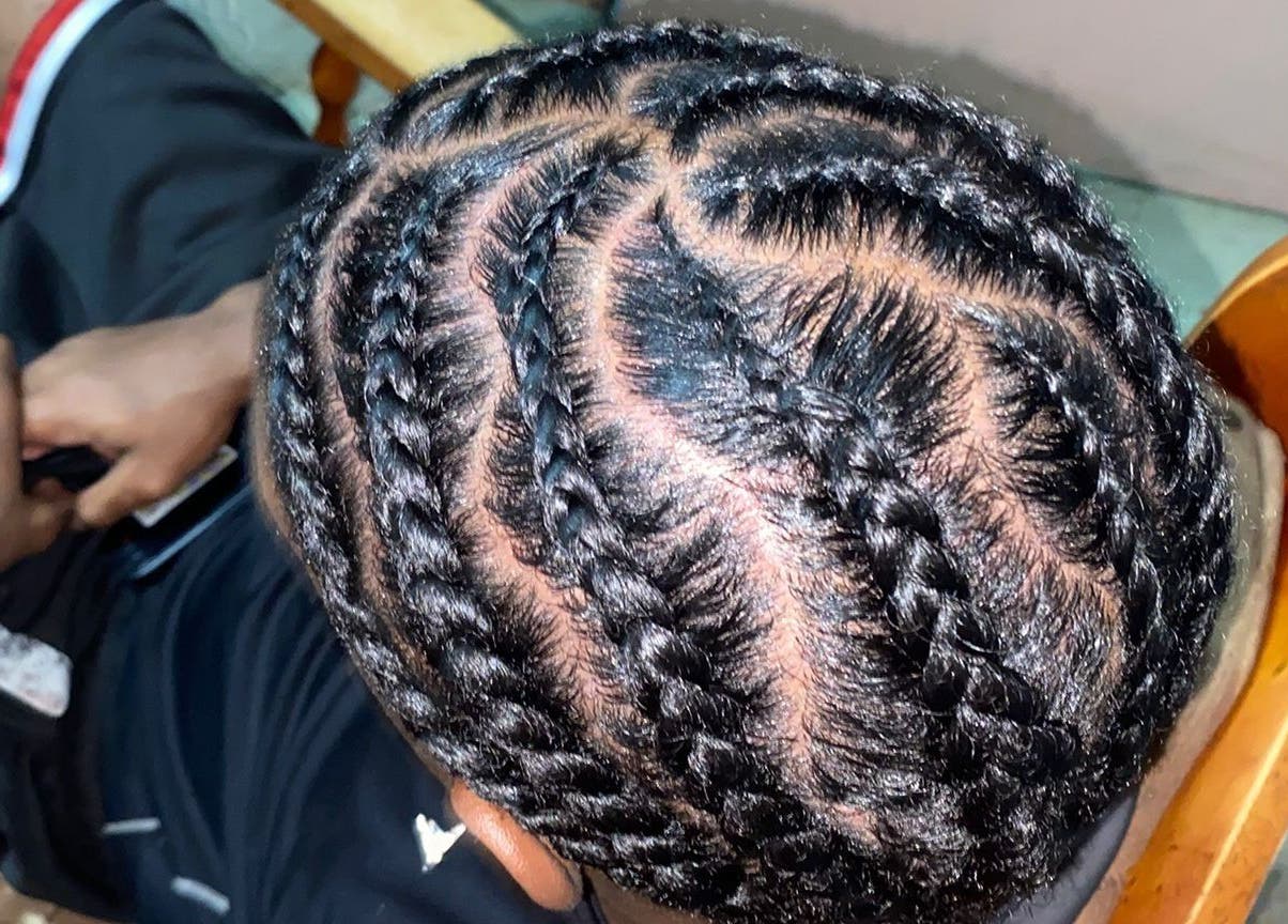 Close-up of intricate braids at Island Braids Beauty Lounge, Bridgetown, Saint Michael, BB showcasing expert styling.