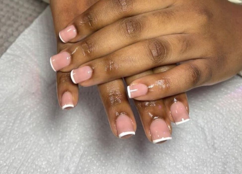 Stylish French manicure at Pure Glow Mani and Pedi, Cape Town, Western Cape, ZA showcasing nail artistry.