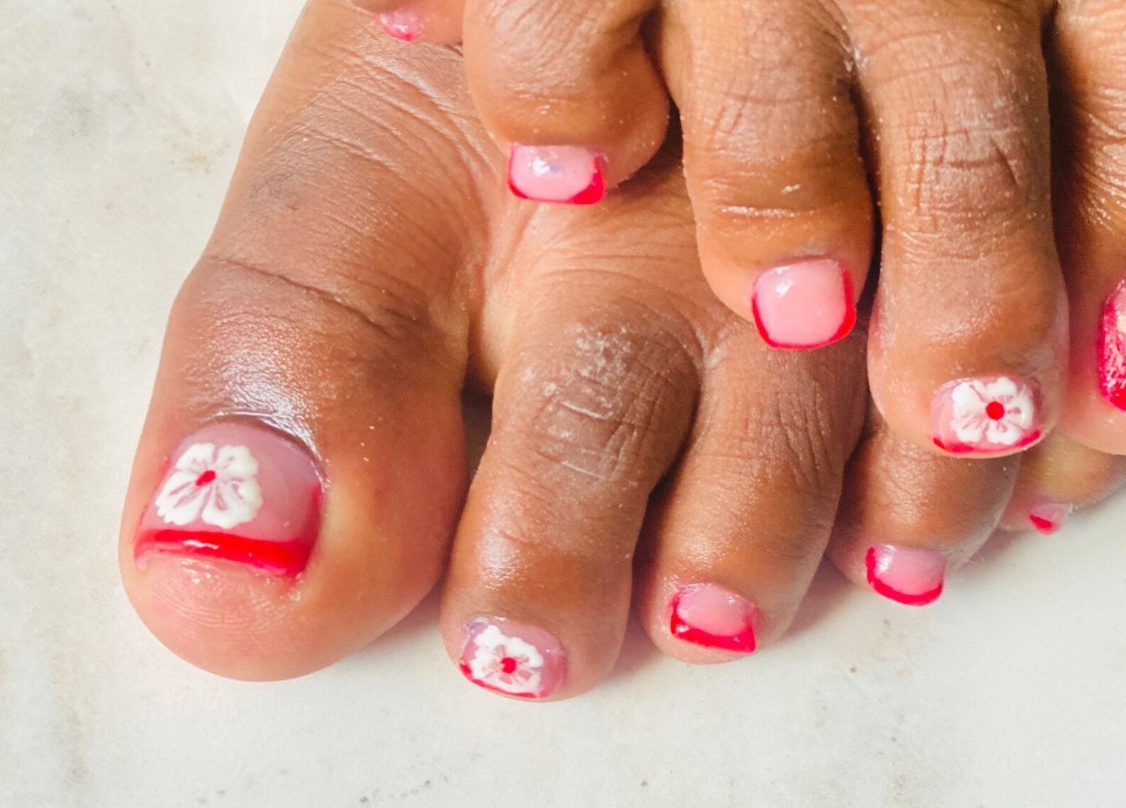 Floral nail art on toes by Pure Glow Mani And Pedi Mobile, Cape Town, Western Cape, ZA.