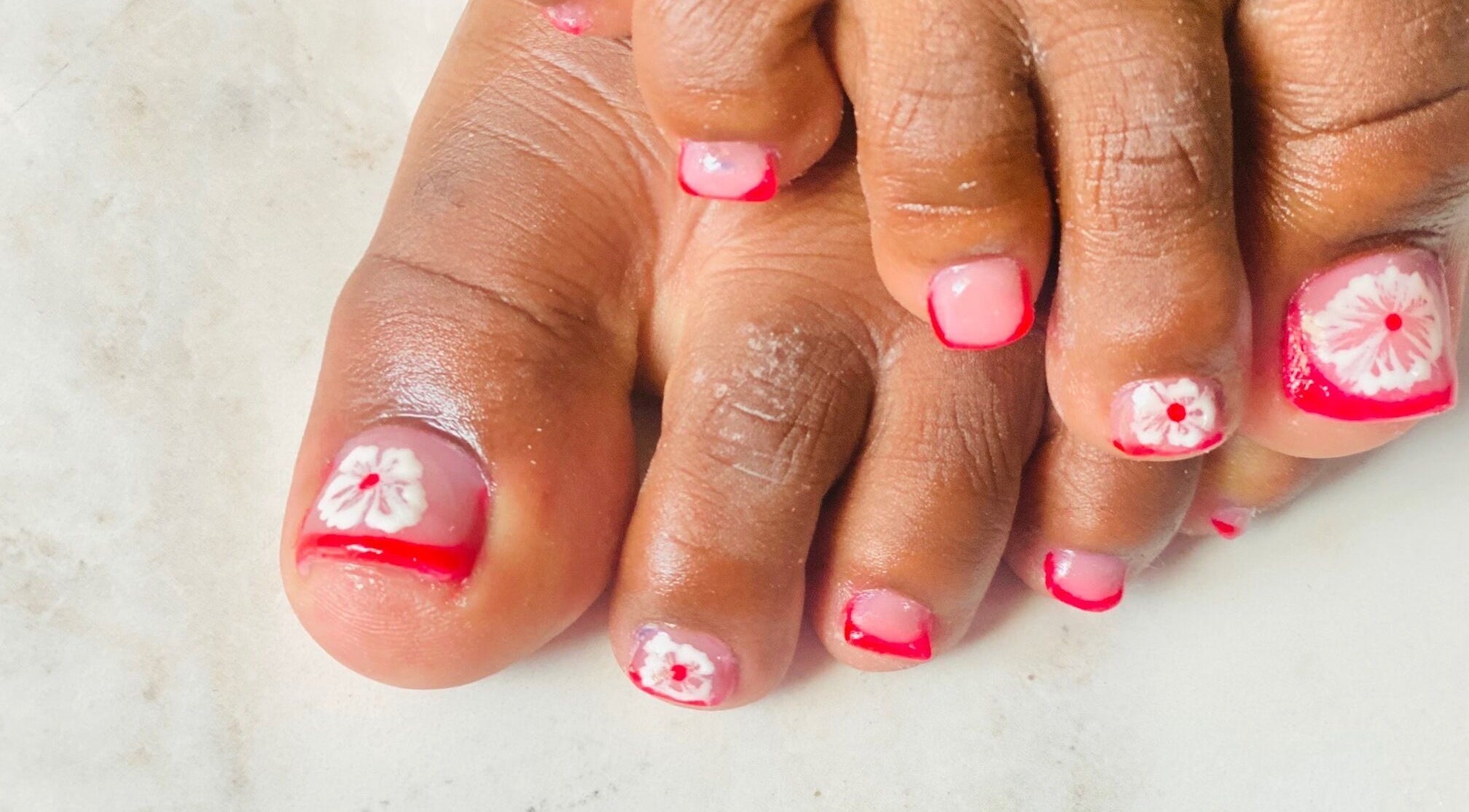 Floral nail art on toes by Pure Glow Mani And Pedi Mobile, Cape Town, Western Cape, ZA.