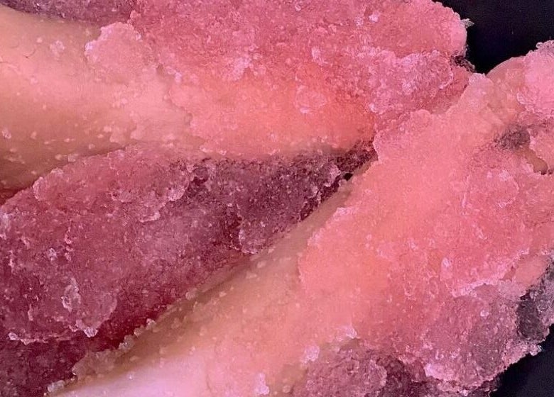 Exfoliating foot scrub at Pure Glow Mani And Pedi Mobile, Cape Town, Western Cape, ZA.