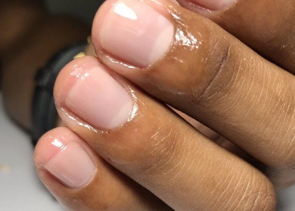 Polished nails from Pure Glow Mani And Pedi Mobile in Cape Town, Western Cape, ZA showcasing glossy finish.